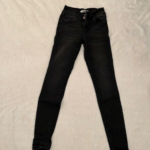 Black mid rise skinny jeans